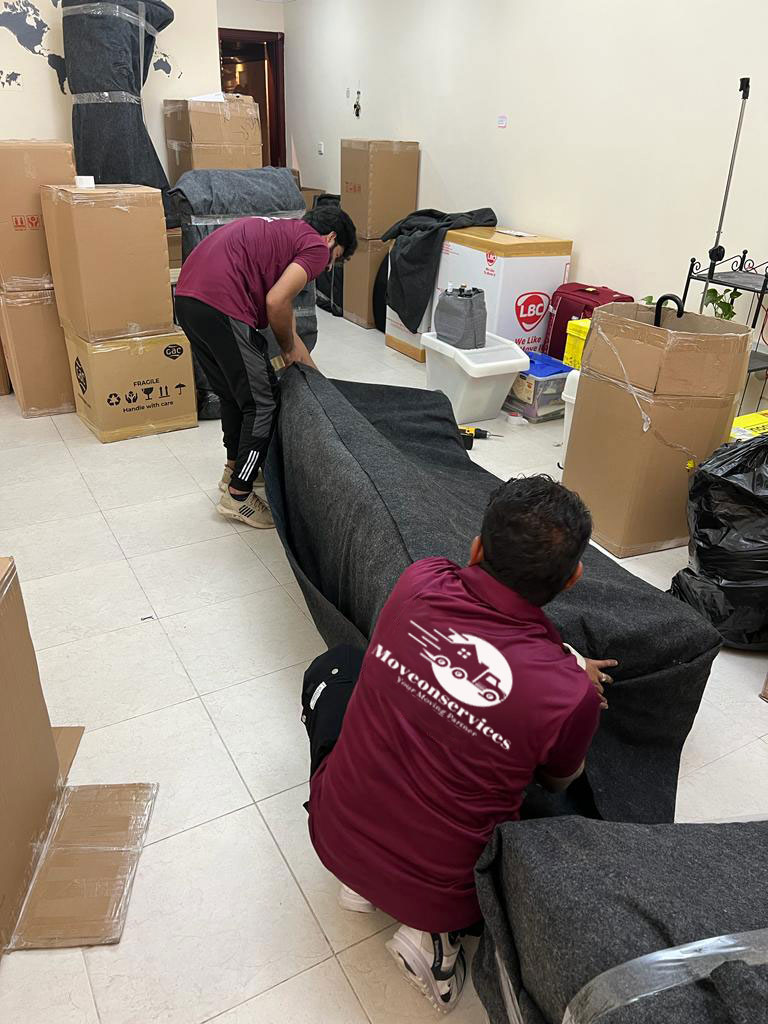 Packers-packing-Sofa-for-Moving
